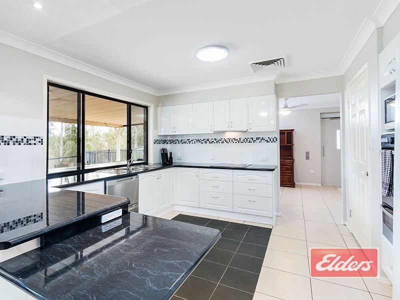 140 Canterbury Drive, Mundoolun QLD 4285