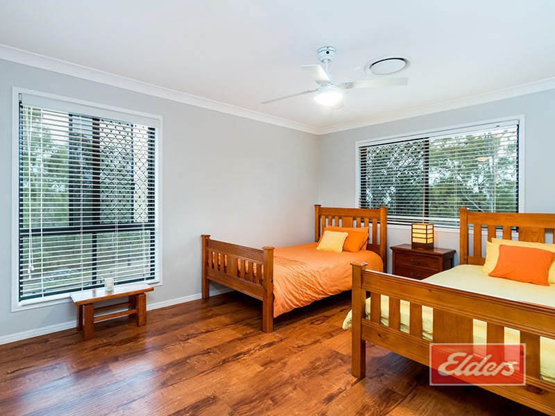 140 Canterbury Drive, Mundoolun QLD 4285