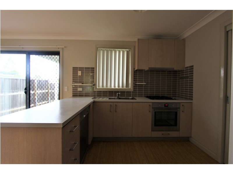 7 Northampton Drive, Glenfield NSW 2167