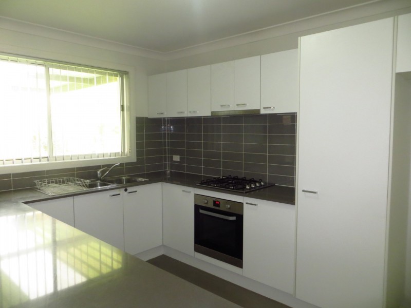35 Northampton Drive, Glenfield NSW 2167