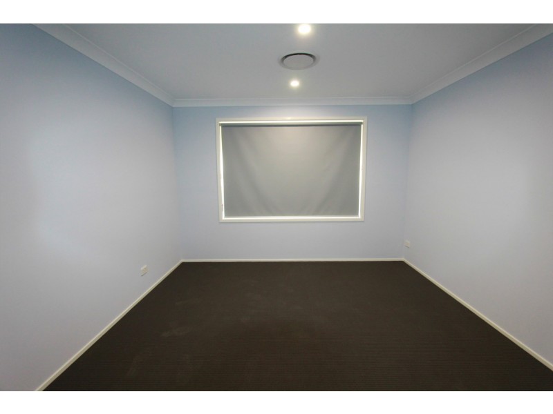 5 Oxalis Street, Denham Court NSW 2565
