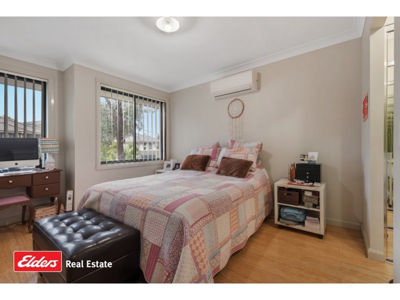 7 Northampton Drive, Glenfield NSW 2167