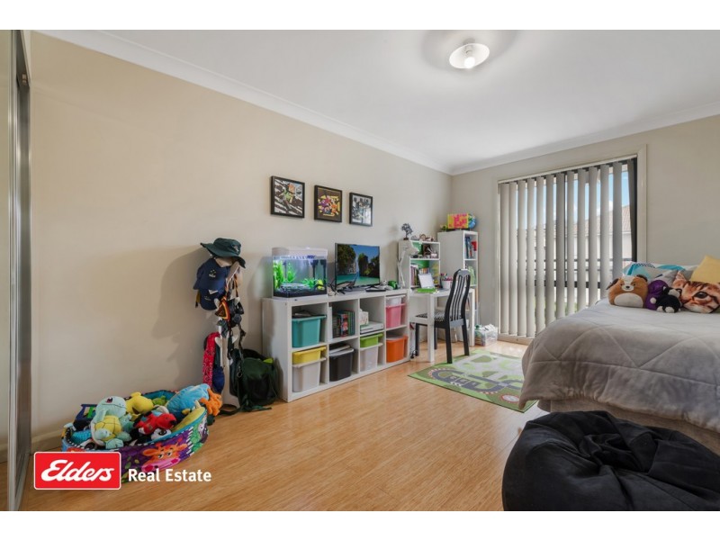 7 Northampton Drive, Glenfield NSW 2167