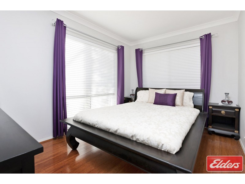 7 Hillsborough Cres, Glenfield NSW 2167