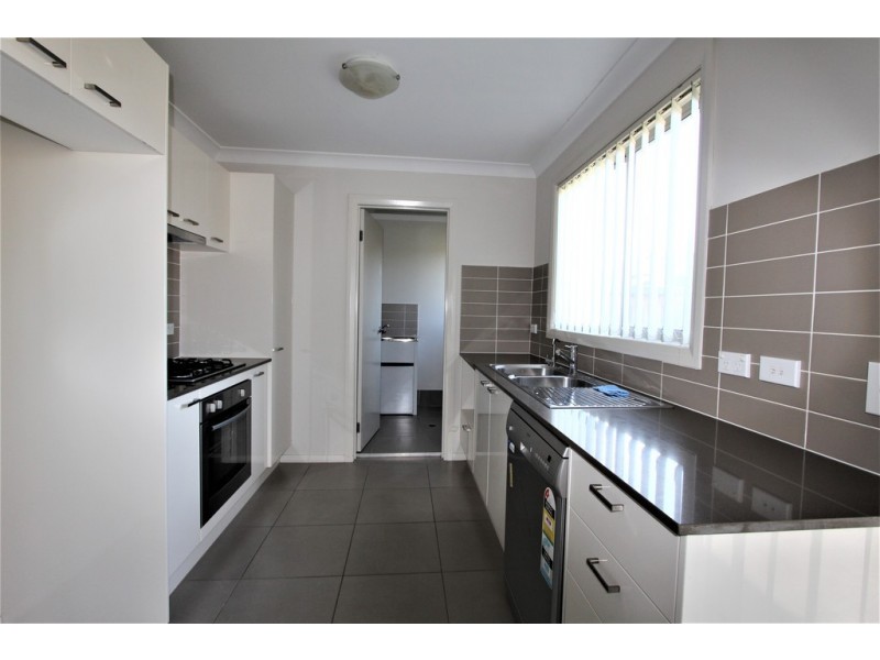 63 Mary Ann Drive, Glenfield NSW 2167