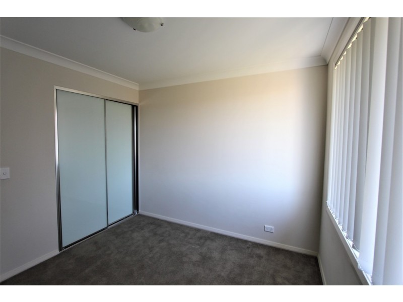 63 Mary Ann Drive, Glenfield NSW 2167