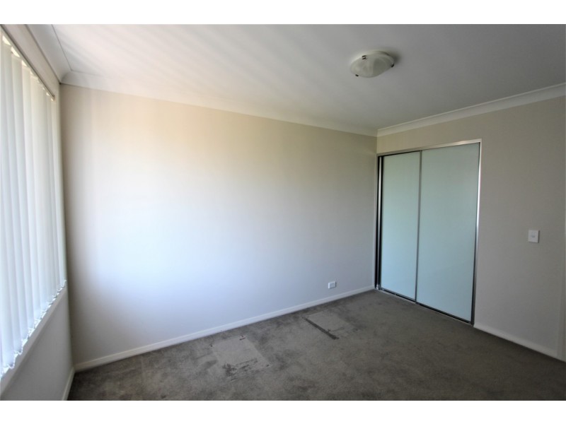 63 Mary Ann Drive, Glenfield NSW 2167
