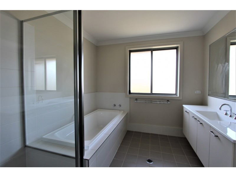 63 Mary Ann Drive, Glenfield NSW 2167