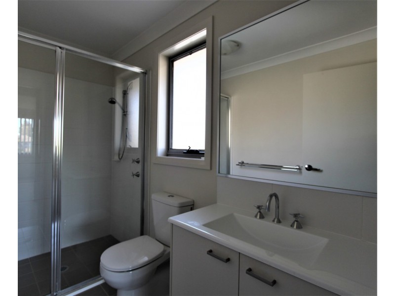 63 Mary Ann Drive, Glenfield NSW 2167
