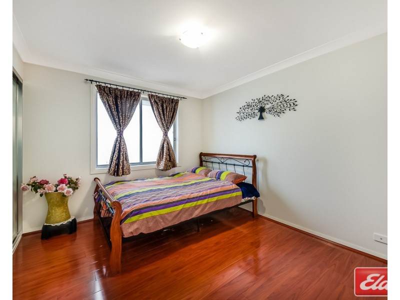 63 Eleanor Drive, Glenfield NSW 2167