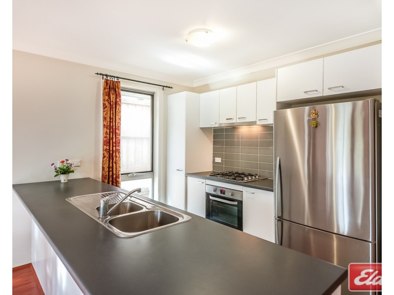 63 Eleanor Drive, Glenfield NSW 2167