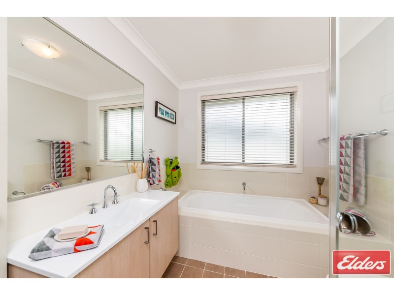 11 Grenada Road, Glenfield NSW 2167