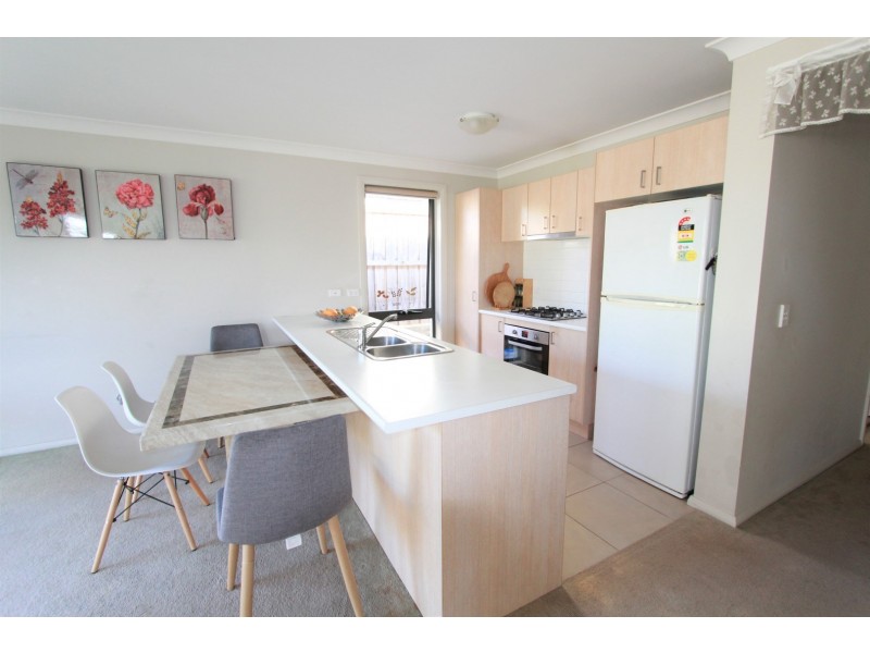 65 Eleanor Drive, Glenfield NSW 2167