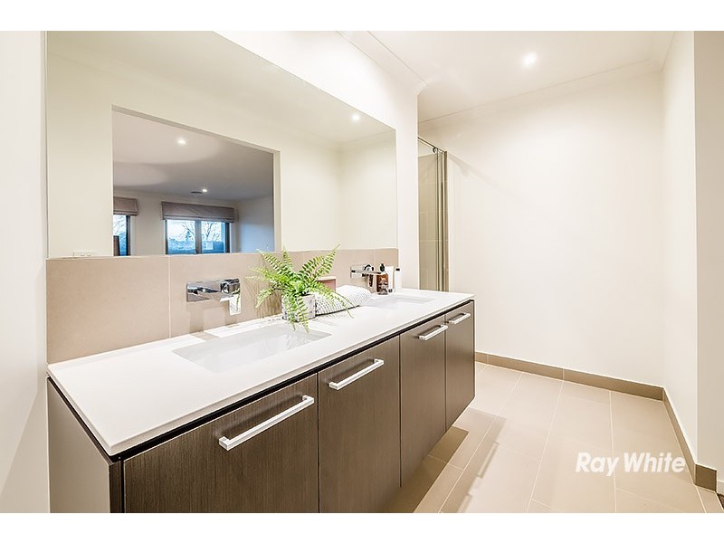 64 Flowerbloom Crescent, Clyde North VIC 3978