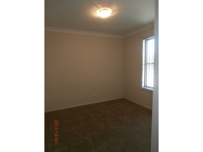 1/57-59 Illowra Cres, Primbee NSW 2502