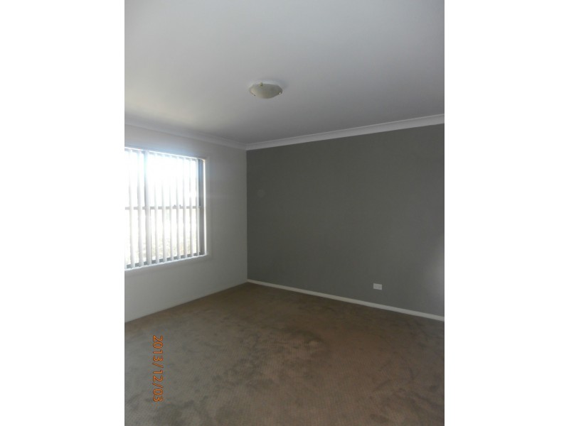 1/57-59 Illowra Cres, Primbee NSW 2502