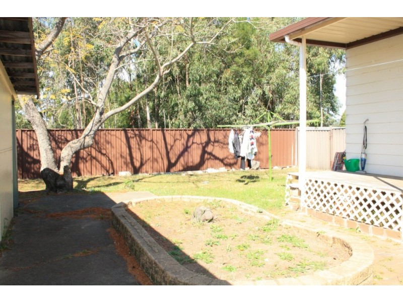 31 Wattle Ave, Macquarie Fields NSW 2564