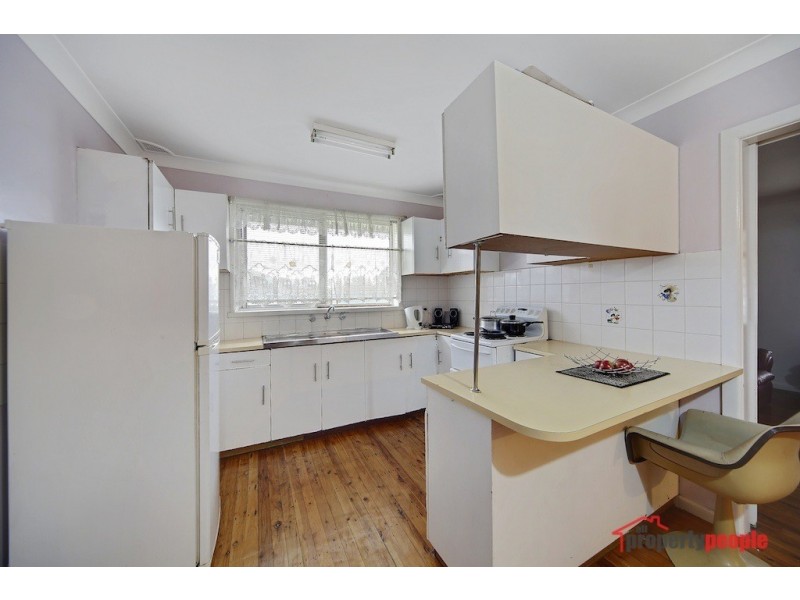 24 First Avenue, Macquarie Fields NSW 2564