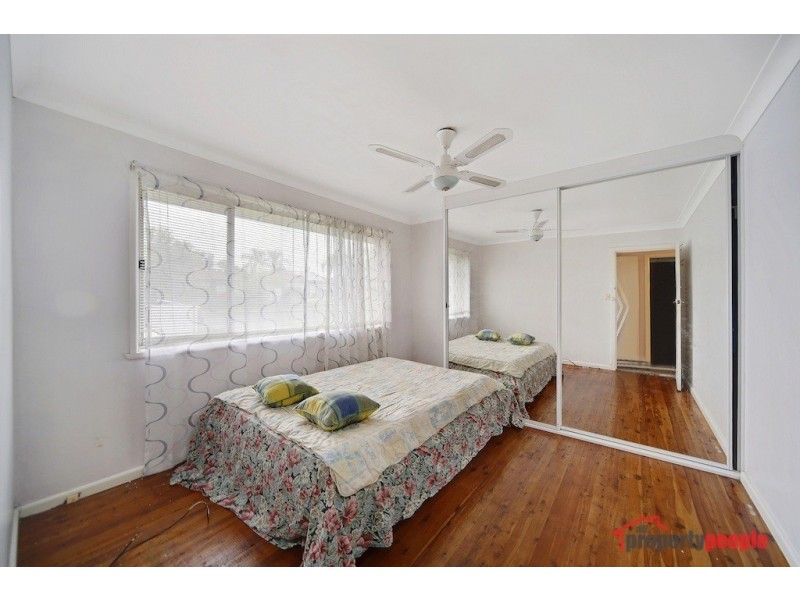24 First Avenue, Macquarie Fields NSW 2564