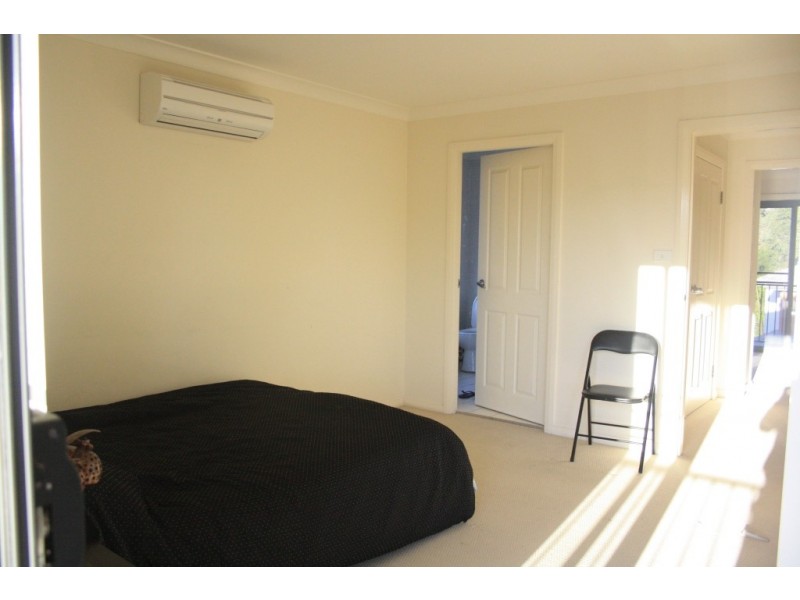 2/2 Myee Rd, Macquarie Fields NSW 2564