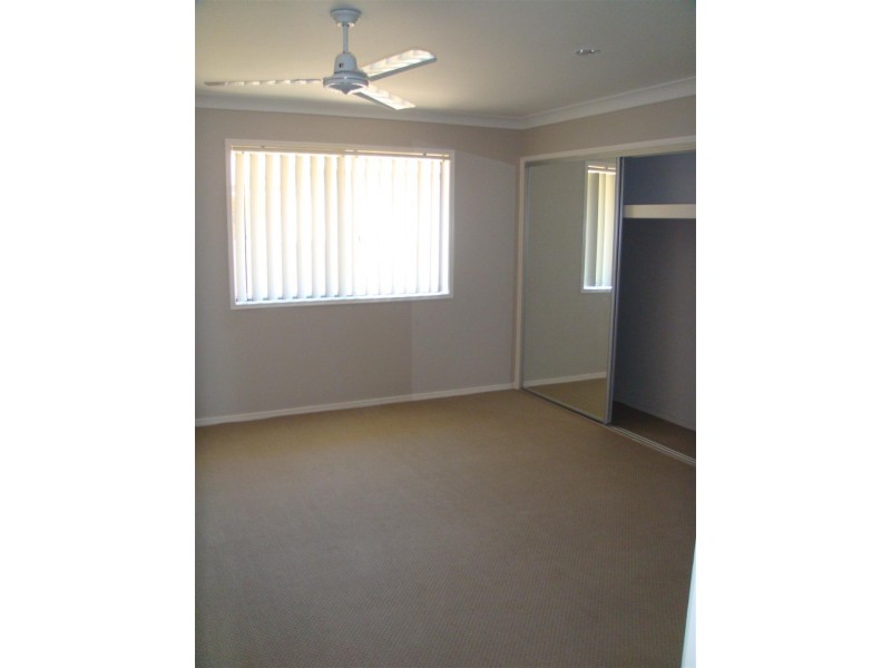 15 Chesterton Street, Pacific Pines QLD 4211