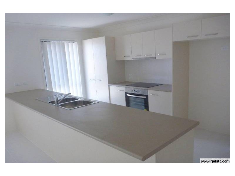 15 Rise Cct, Pacific Pines QLD 4211
