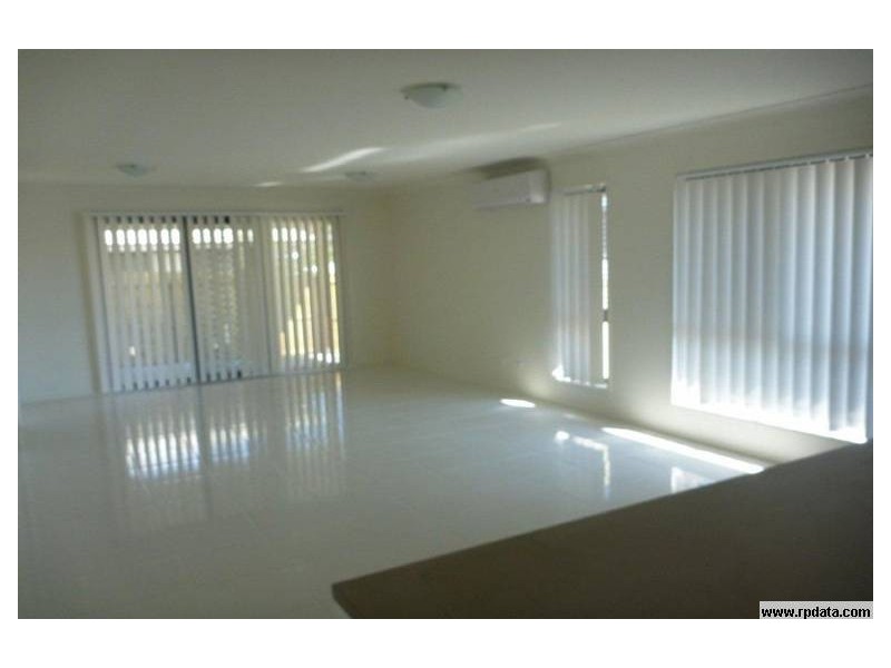 15 Rise Cct, Pacific Pines QLD 4211