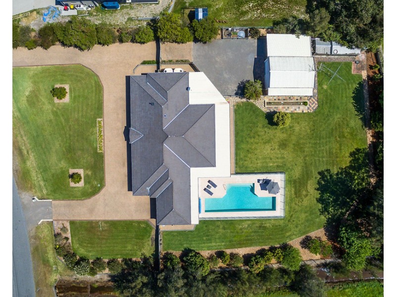 10 Melaleuca Drive, One Mile NSW 2316