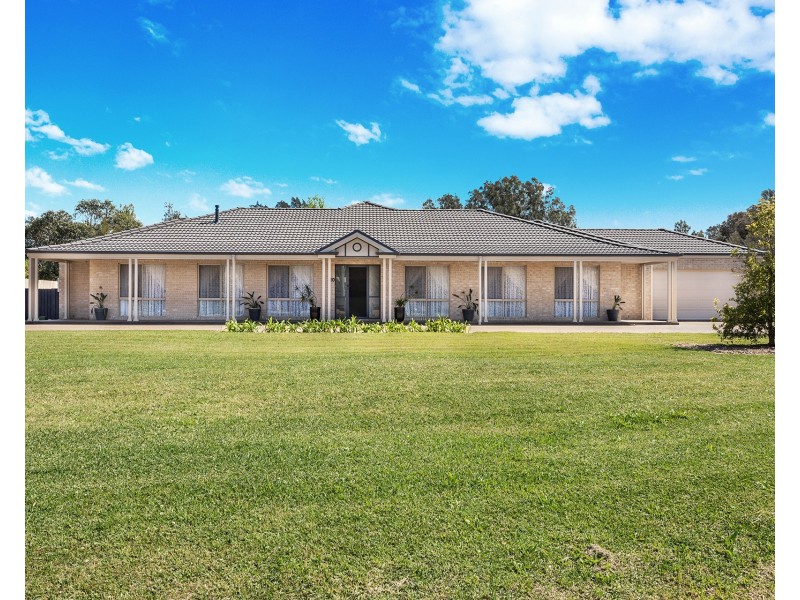 10 Melaleuca Drive, One Mile NSW 2316