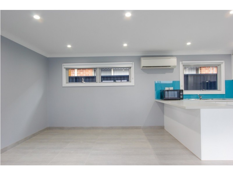 1A Quamby Court, Wattle Grove NSW 2173