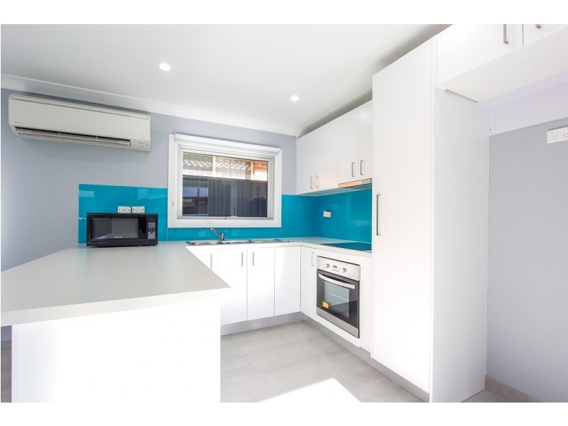 1A Quamby Court, Wattle Grove NSW 2173