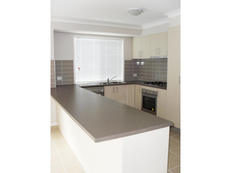 9 Barradeen Cct, Pacific Pines QLD 4211