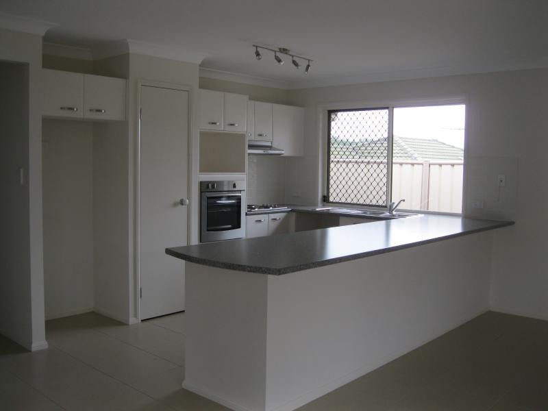 37 Skinner Cres, Silkstone QLD 4304