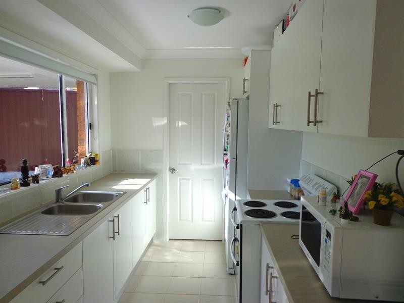 15 Alamein Rd, Bossley Park NSW 2176