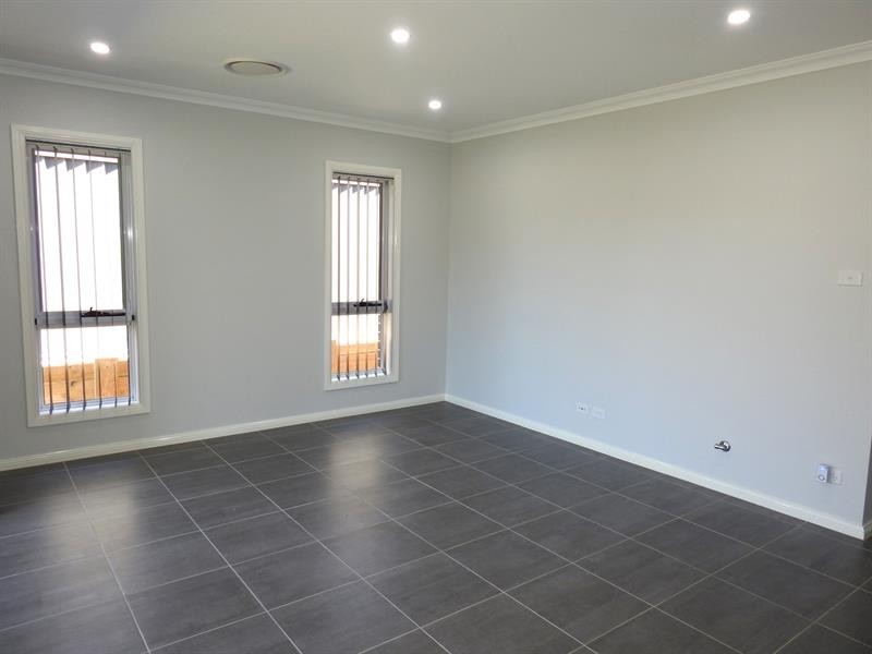 73 Commissioners Dr, Denham Court NSW 2565