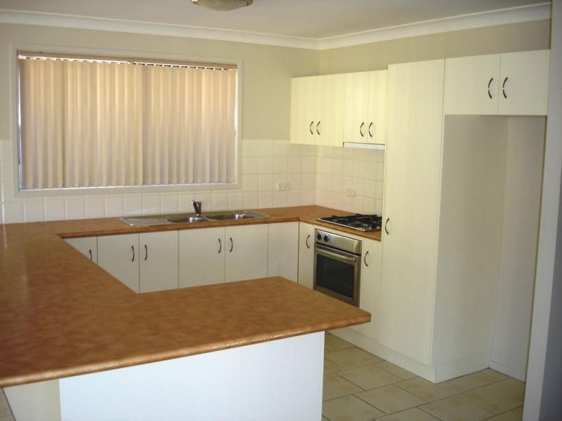 9 Flame Tree Cl, Hamlyn Terrace NSW 2259