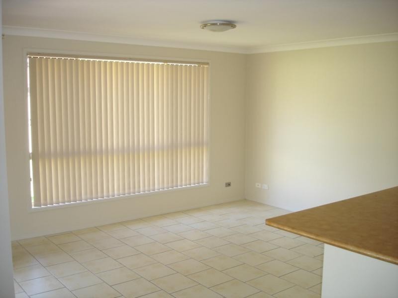 9 Flame Tree Cl, Hamlyn Terrace NSW 2259