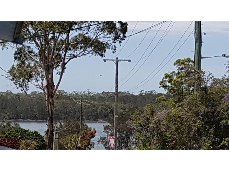 15 Moorooba Rd, Coomba Park NSW 2428