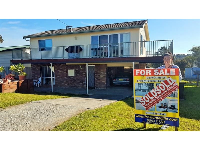15 Moorooba Rd, Coomba Park NSW 2428
