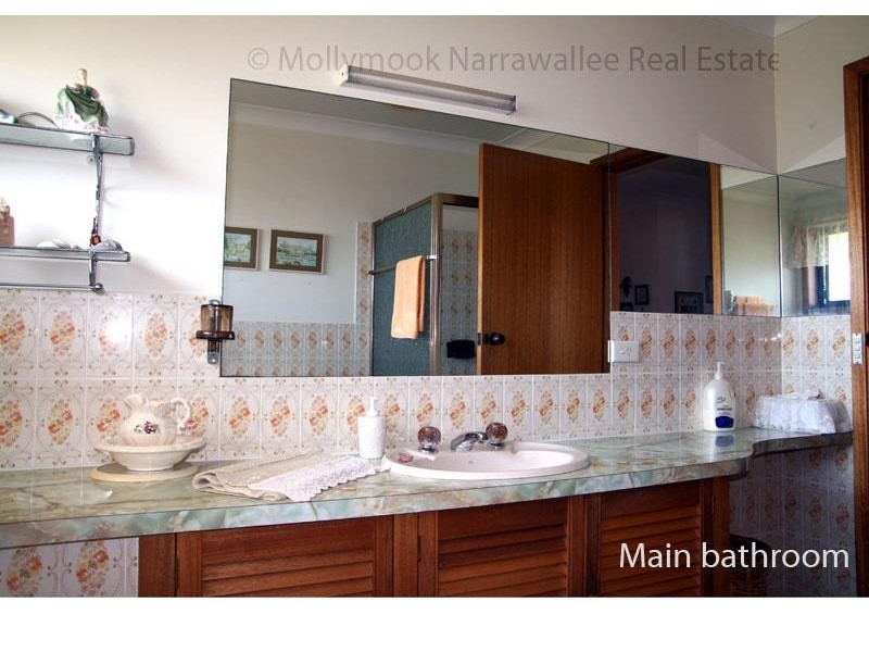 16 Booth Ave, Narrawallee NSW 2539
