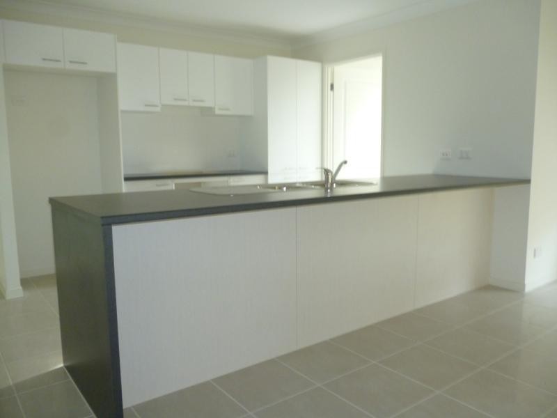 12 Tall Trees Dr, Glenmore Park NSW 2745