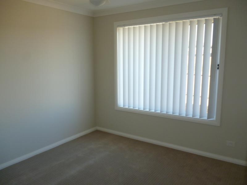 7 McGuire Cres, Ingleburn NSW 2565