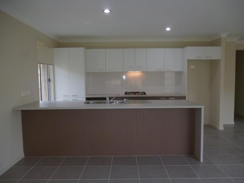 18 Tall Trees Dr, Glenmore Park NSW 2745