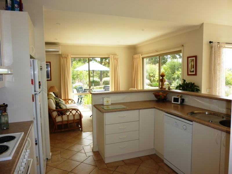 64 Stringybark Place, Millingandi NSW 2549