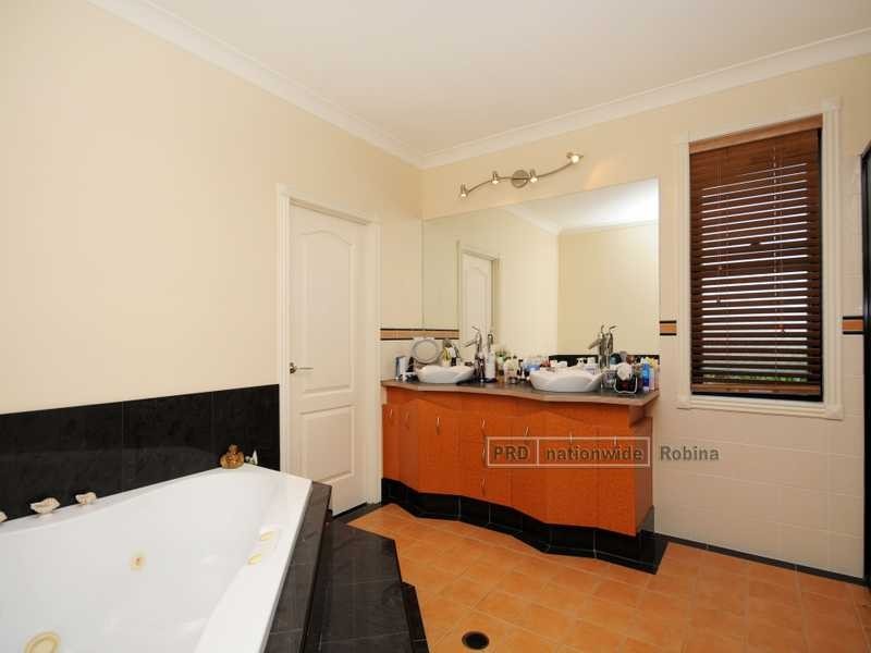 64 Peach Drive, Robina QLD 4226
