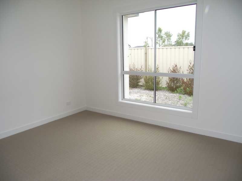 18 Reflections Drive, One Mile NSW 2316