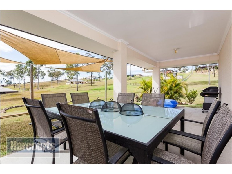 22 Prince Of Wales Crt, Mundoolun QLD 4285