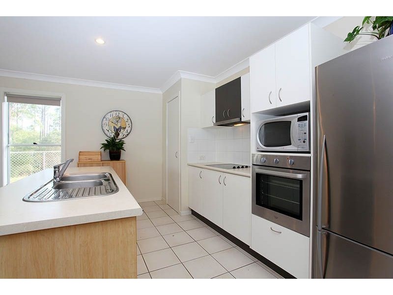 12 Norfolk Drive, Pacific Pines QLD 4211