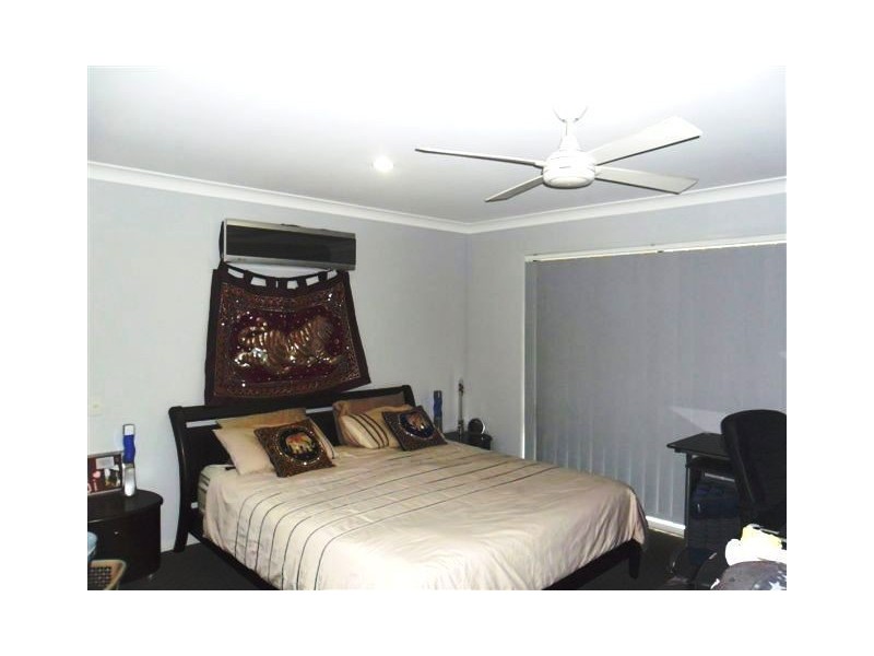 34 McAuley Parade, Pacific Pines QLD 4211