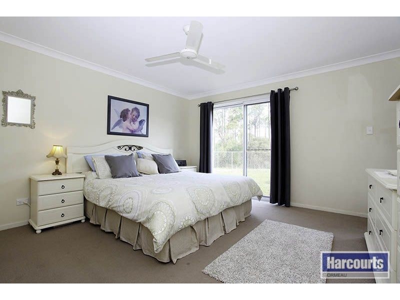 12 Norfolk Drive, Pacific Pines QLD 4211